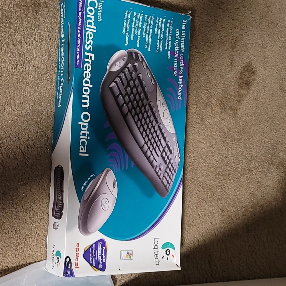 Logitech cordless freedom optical - cordless keyboard and optical mouse